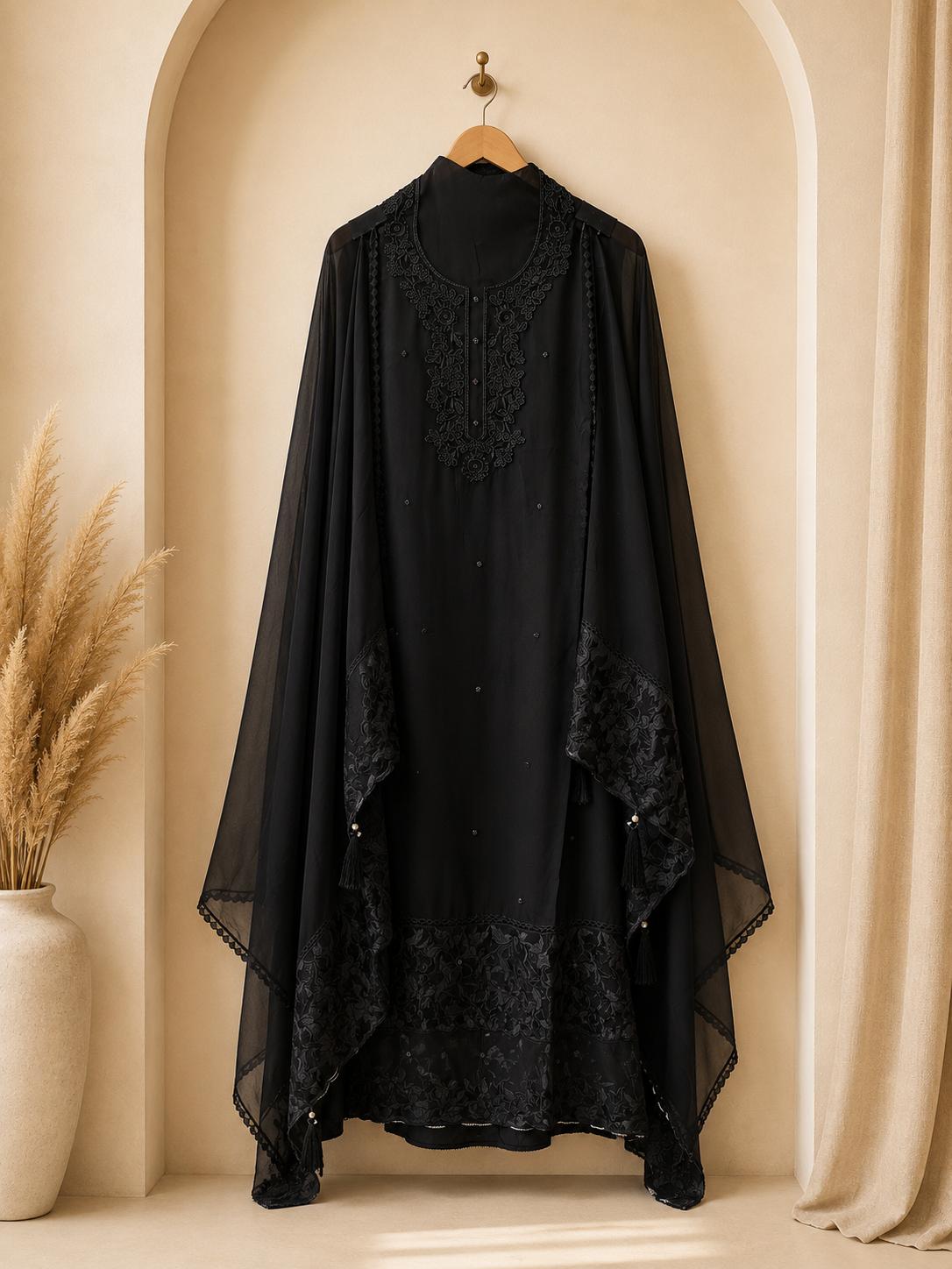 Luxurious unstitched black suit crafted for sophisticated party wear